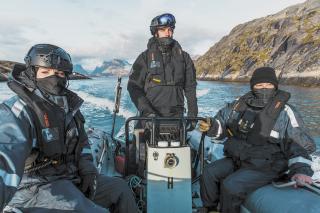 Royal Canadian Navy personnel transit through the Maniitsoq Fjord