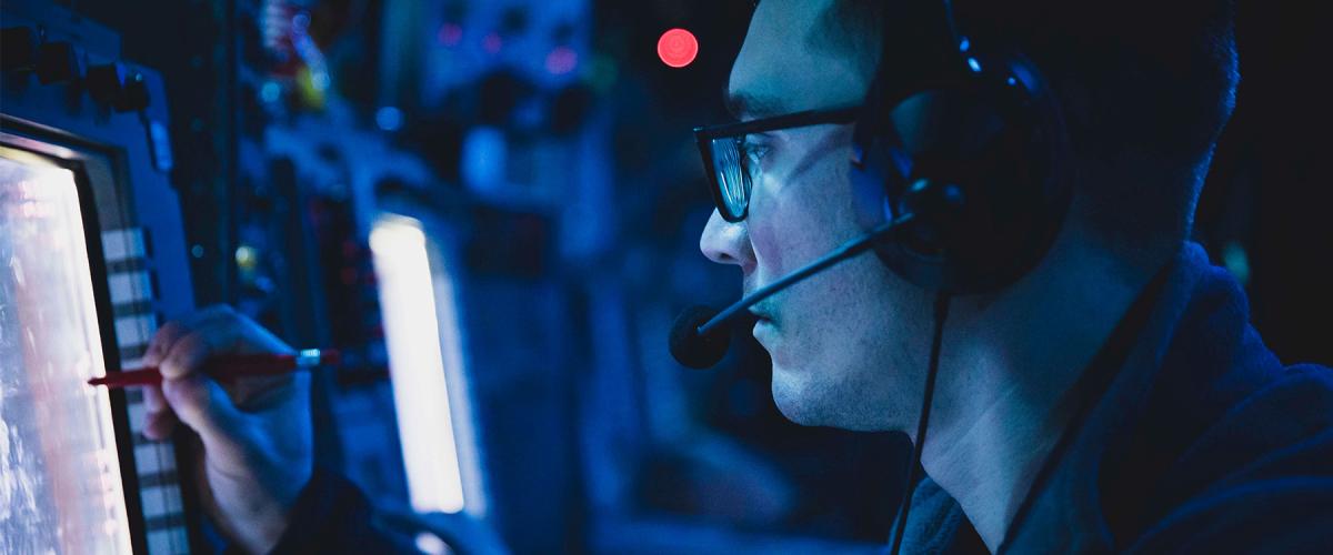 A sailor on board the USS Porter (DDG-78)